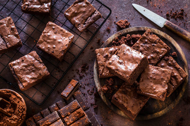 Brownies Kurnia yang lezat dengan tekstur lembut dan cita rasa kaya cokelat dari bubuk kakao premium, dipanggang dengan sempurna.